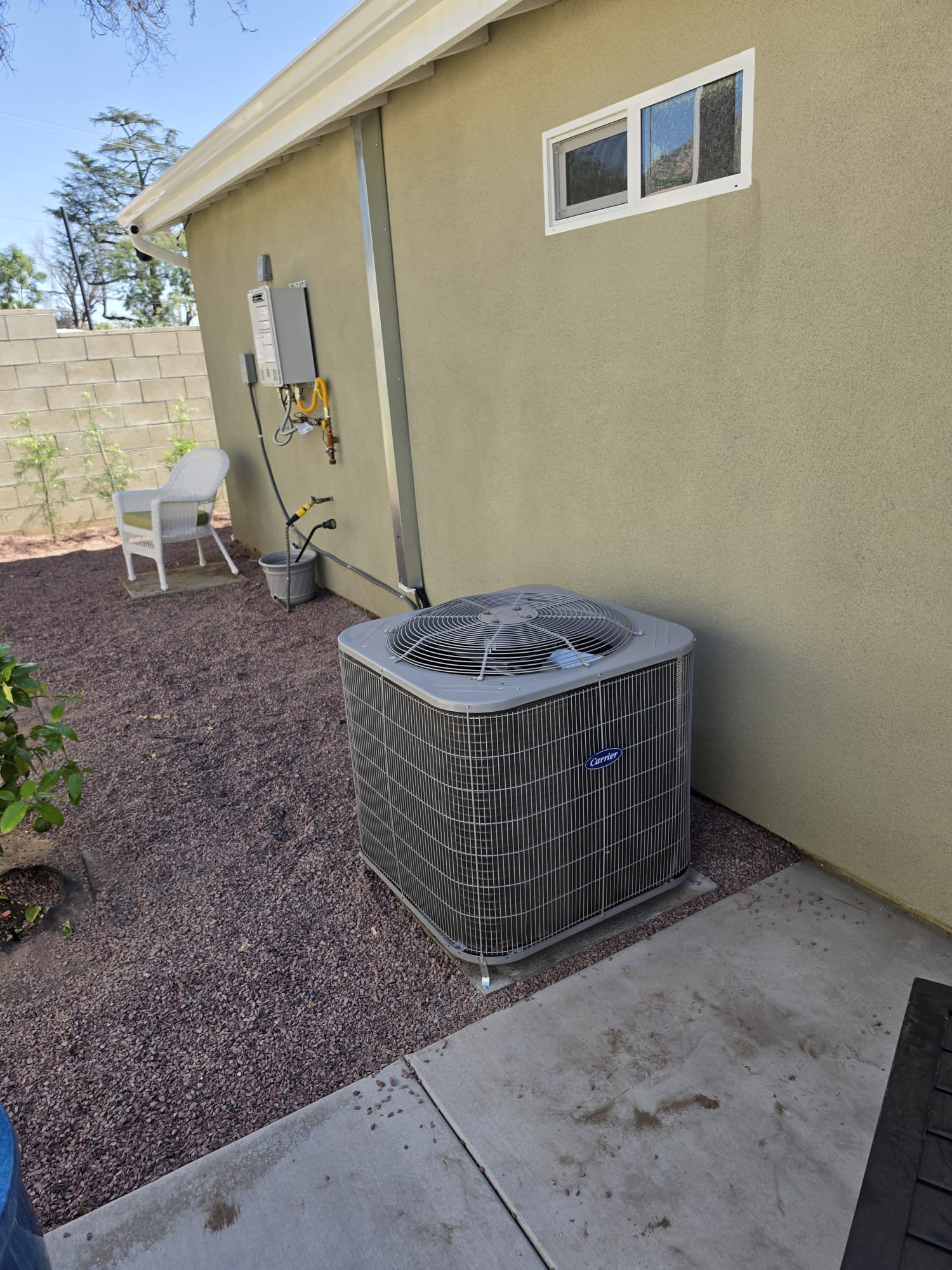 HVAC professional installing a premium air conditioning system